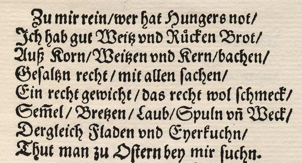 Die acht Verse von Hans Sachs zum Bäcker in Fraktur: „Zu mir rein, wer hat Hungers not, ich hab gut Weitz vnd Rücken Brot, auß Korn, Weitzen vnd Kern bachen, gesaltzn recht mit allen sachen, ein recht gewicht, das recht wol schmeck, Semel, Bretzen, Laub, Spuln vnd Weck, dergleich Fladen vnd Eyerkuchn thut man zu Ostern bey mir suchn.“